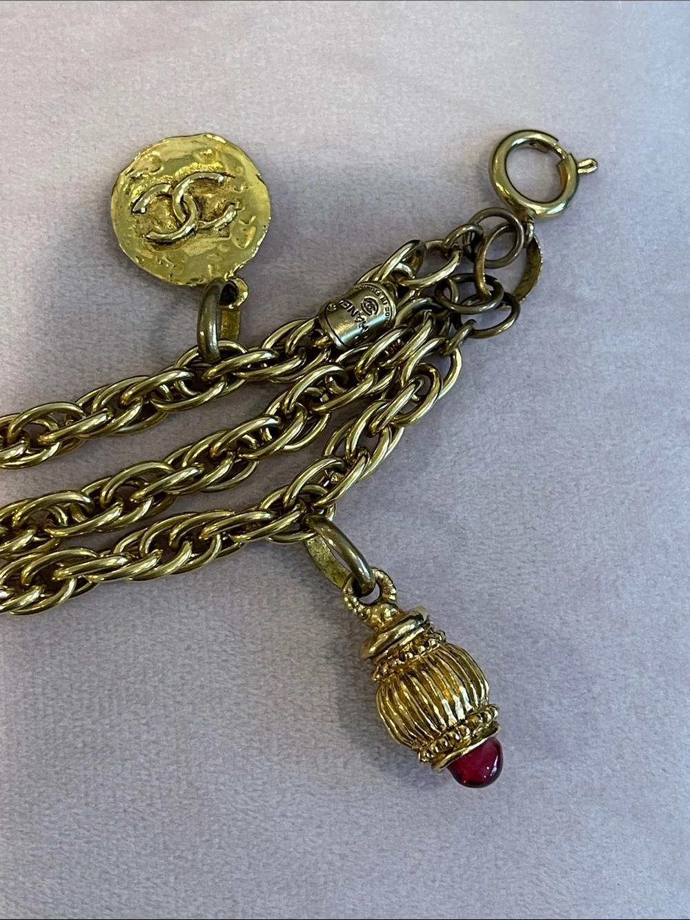 CHANEL Gold-Tone Double Chain Charm Bracelet with Red and Green Bead Drops